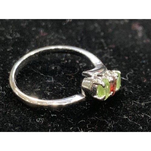 Silver ring with precious stone